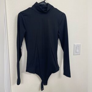 Soft Matte Seamless Long-Sleeve Mockneck
Bodysuit